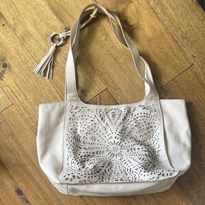 The Sak Cream Laser-Cut Leather Tote with Tassel Charm